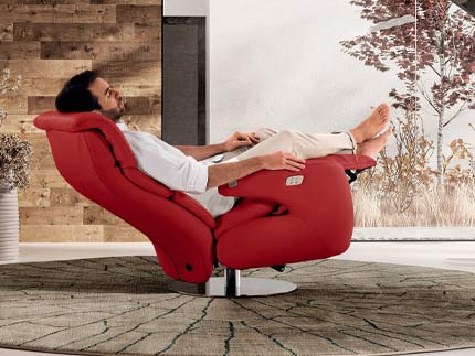fauteuil relax cuir rouge.